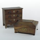 A Regency rosewood and cut brass inlaid work box, of sarcophagus form, on turned feet, 27cm,