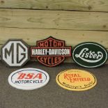 A collection of advertising signs, to include M.