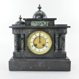 An early 20th century slate mantel clock,