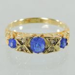 An 18 carat gold, sapphire and diamond boat ring,