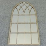 A tall gothic arched garden mirror,