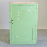 A green painted antique cabinet,