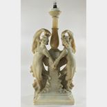 An early 20th century carved white alabaster figure group,