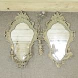 A pair of brass framed cartouche shaped girandoles,