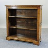 A light oak dwarf open bookcase,