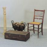 An iron log basket, 59cm, together with a cane seated chair,