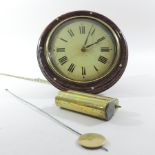 An early 20th century postman's alarm clock,