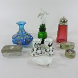 A Wemyss miniature mug, 4cm tall, together with another, porcelain figures,