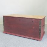 A red painted pine box,