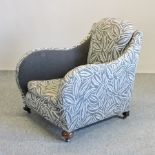 A 1920's grey upholstered armchair,