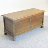 A 1920's oak blanket box,