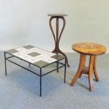 A 1970's tile top and metal framed coffee table, 80cm,