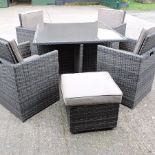 A rattan cube garden table, 121cm, together with four chairs and four stools,