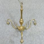 A brass three branch chandelier,