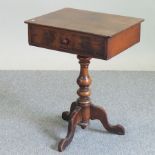 A Victorian mahogany ladies work table, on a tripod base,