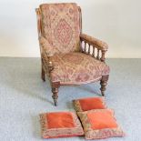 A Victorian oak and geometric upholstered armchair,