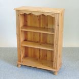 A pine dwarf open bookcase,