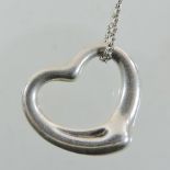 A silver Tiffany open heart pendant,