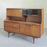 A 1970s G-Plan teak side board,