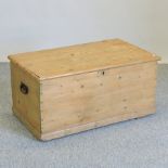 An antique pine blanket box,