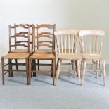 A set of four elm spindle back chairs,