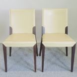 A set of six cream upholstered dining chairs