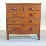 A Victorian mahogany chest, of two short over three long drawers,