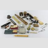 A collection of items, to include a silver cigarette case, pens, condiments,