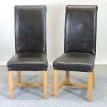 A set of six brown upholstered high back dining chairs