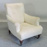 A Howard style cream upholstered armchair