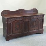 An early 20th century carved sideboard, with a gallery back,