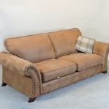 A brown suede upholstered two seater sofa,