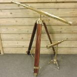 A brass mounted telescope on a stand, approx 100cm tall,