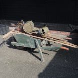 A wooden garden wheelbarrow, 168cm, together with various gardening tools,