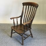 An early 20th century splat back armchair