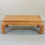 A Chinese elm coffee table,