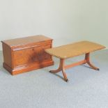 A walnut and crossbanded coffee table, 88cm,