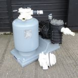 A swimming pool pump and filter,