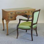 A mid 20th century walnut writing desk, 107cm,