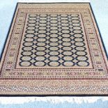 A Bokhara rug on a blue ground,