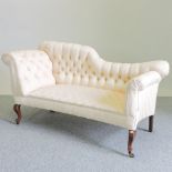 A late 19th century cream upholstered button back chaise longue,