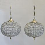 A pair of gilt metal mounted glass chandeliers,