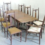 A set of eight Arts and Crafts oak dining chairs, in the style of E G Punnet for William Birch,