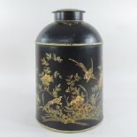 A tole style black painted metal canister and cover,