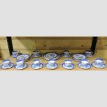 A collection of blue and white Willow pattern tea wares