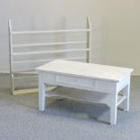 A white painted side table, with a single drawer, 101cm, together with a green painted wall shelf,