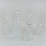 A collection of six various cut glass decanters