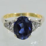 An 18 carat gold sapphire and diamond ring,