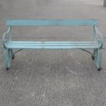 A painted iron and wooden garden bench,