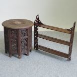 An Edwardian mahogany three tier wall shelf, with fret carved decoration, 57cm,